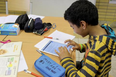 Enfant avec un IPad